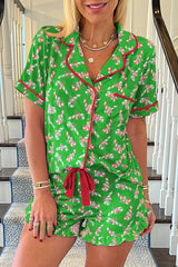 Grünes Pyjama-Set mit weihnachtlichem Zuckerstangen-Print und Taschen