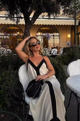 Teilen Sie Ihre Geschichte – Maxikleid mit V-Ausschnitt