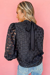 No Secrets – Schwarzes Oberteil mit auffälligen Ärmeln und Bindeband am Rücken