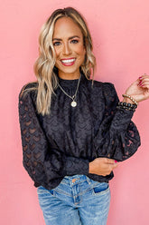 No Secrets – Schwarzes Oberteil mit auffälligen Ärmeln und Bindeband am Rücken