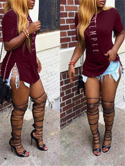 T-Shirt mit Slogan und Seitenschlitz – Ausverkauf