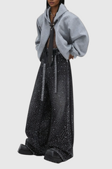 Aderyn Wide Jeans mit Strassschnalle