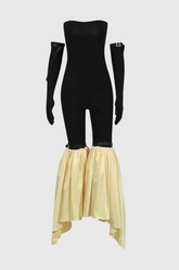 Agnew – Trägerloser, figurbetonter Jumpsuit mit dekonstruierter Rüsche