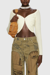 Agrata – Figurbetontes Strickoberteil mit Schmetterlingsmotiv