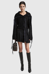 Aideen – Kurzes Stricktop mit Fransen und Cut-Outs