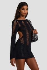 Akinobu – Zerrissenes, rückenfreies Oberteil mit Cut-outs in Schwarz