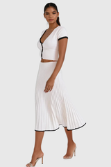 Alvar – Tief ausgeschnittenes Strickrock-Set mit Rüschen