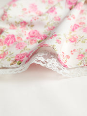Kurzes Kleid mit Blumenmuster und Bindegürtel