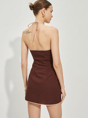 Rückenfreies Kleid mit Knotendetail und Kontrastbesatz