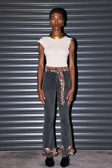 Schwarze Jeans mit Zopfmuster und Leopardenmuster