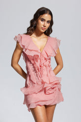 Maura – Asymmetrisches Minikleid mit V-Ausschnitt und Rüschen in Rosa