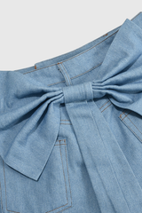 Oviya – Kurze Jeans mit Schleife und Fransen