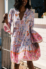 Send My Love – Boho-Babydoll-Minikleid mit Blumenmuster und Glockenärmeln