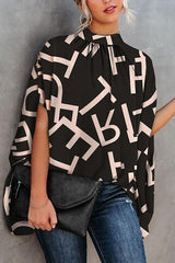 Beyond Imagination – Bedruckte Bluse mit Cape-Ärmeln