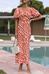 Sweetest Hello – Bedrucktes Midikleid mit Ballonärmeln und Twist