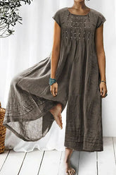 Tina – Kurzärmliger Jumpsuit mit weitem Bein und Rüschendetail