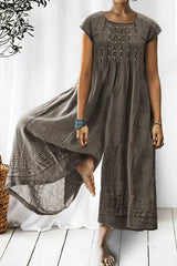 Tina – Kurzärmliger Jumpsuit mit weitem Bein und Rüschendetail