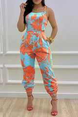 Libby – Rückenfreier Jumpsuit mit tropischem Muster und überkreuzten Schnürdetails