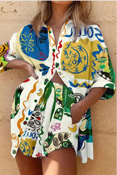 Ivana – Oversize-Bluse aus Leinenmischung mit einzigartigem Aufdruck und Shorts mit Taschen und elastischer Taille