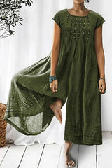 Tina – Kurzärmliger Jumpsuit mit weitem Bein und Rüschendetail