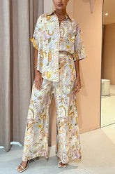 Ritterliche Hose aus Leinenmischung mit mythologischem Muster, elastischer Taille und Taschen und weitem Bein