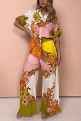 Elevate Your Wear – Oversize-Bluse aus Leinenmischung mit kreativen Blumenmuster und Knopfleiste