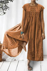 Tina – Kurzärmliger Jumpsuit mit weitem Bein und Rüschendetail