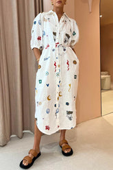 Midikleid mit auffälligem Print, Puffärmeln, Seitentaschen und Bindeband