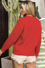 Feurig roter Pullover mit Pailletten und Weihnachtsbaum-Skizze, überschnittenen Schultern