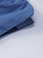 Einfarbiges Neckholder-Crop-Top mit Perlendetail und klassischer Verzierung - Schwarz