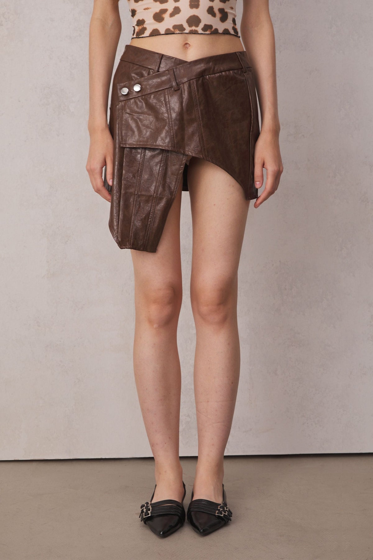 Aubrie Cross Asymmetric Leather Skirt