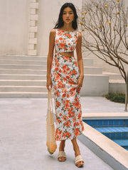 Langes Kleid mit Blumenmuster, Knotendetail und Schlitz