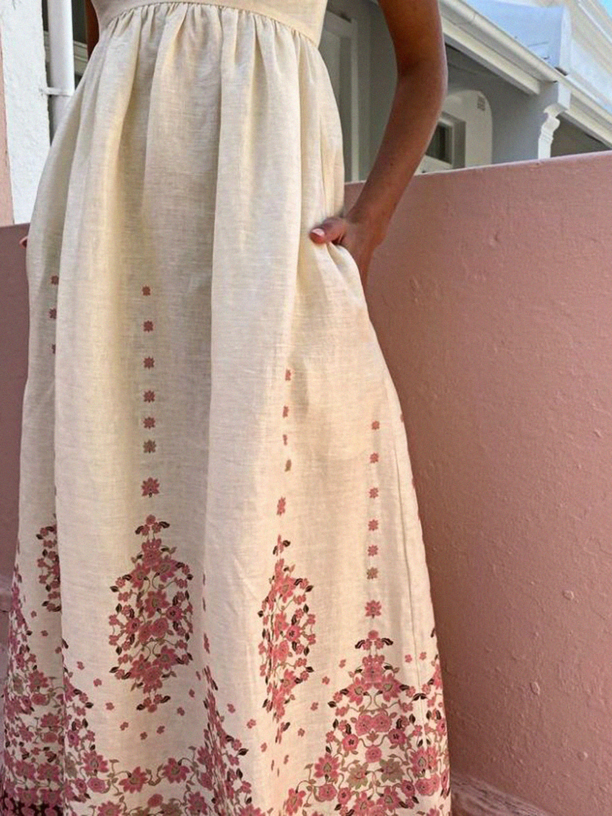 Langes Kleid mit Spaghettiträgern und Blumenmuster