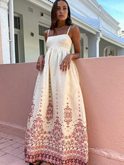 Langes Kleid mit Spaghettiträgern und Blumenmuster