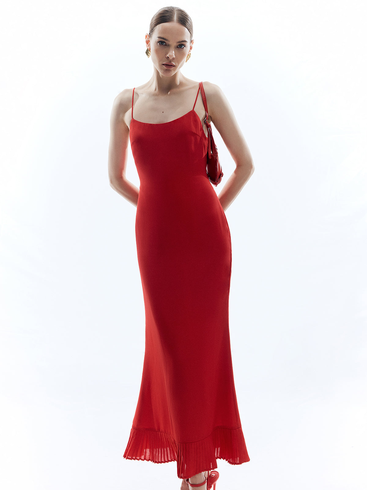 Rückenfreies, ärmelloses, einfarbiges, langes Kleid