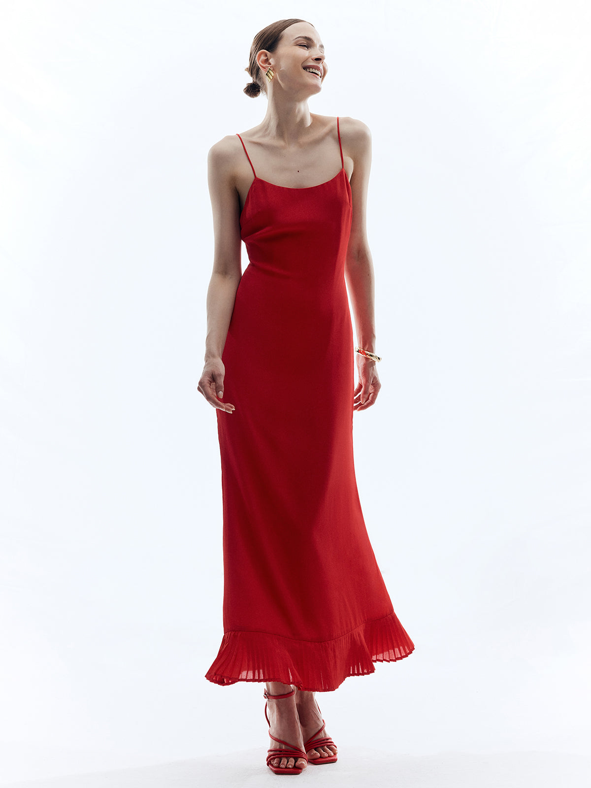 Rückenfreies, ärmelloses, einfarbiges, langes Kleid