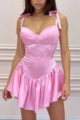 Rosa Korsettkleid mit Rüschen und Bindeträgern