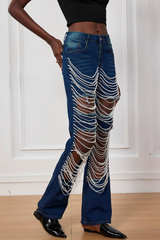 Seraphina – Zerrissene Jeans mit Kettenausschnitt