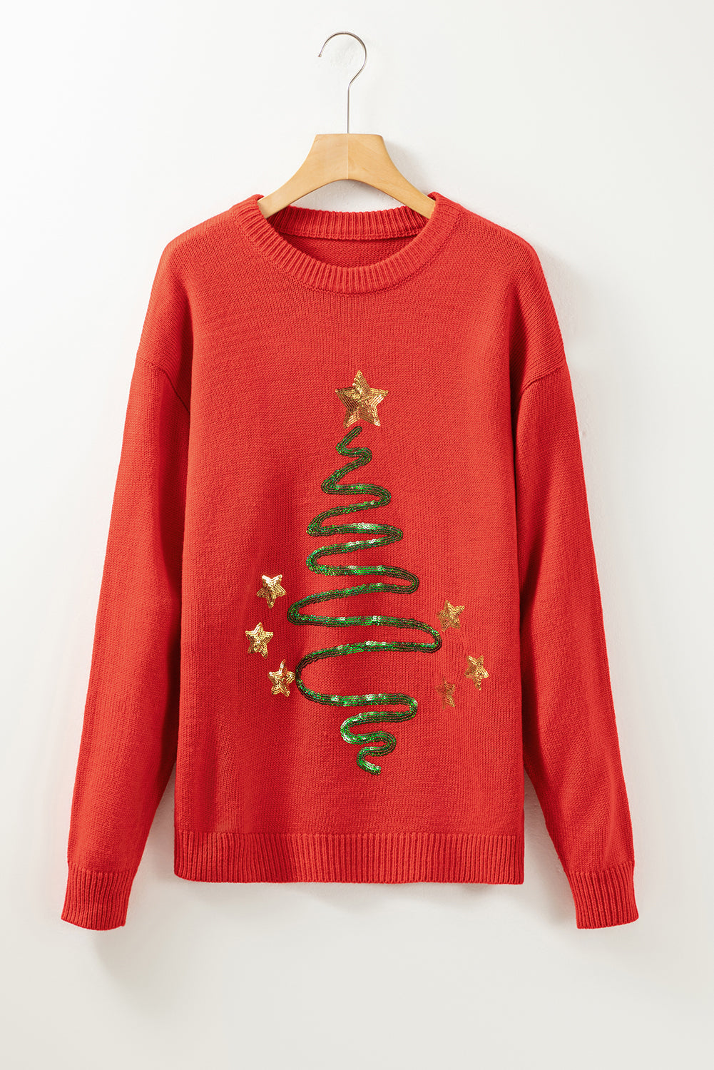 Feurig roter Pullover mit Pailletten und Weihnachtsbaum-Skizze, überschnittenen Schultern