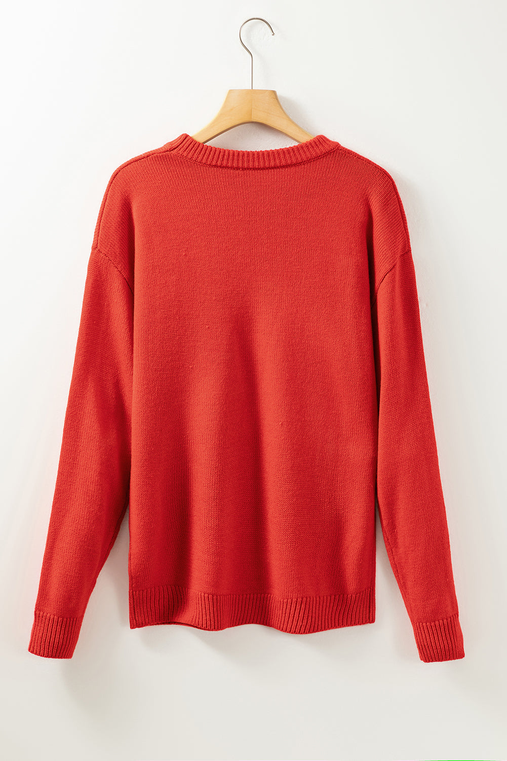 Feurig roter Pullover mit Pailletten und Weihnachtsbaum-Skizze, überschnittenen Schultern