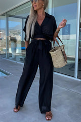 First Choice for Vacation Wrap Blouse and Pocketed Elastic Waist Pants Set